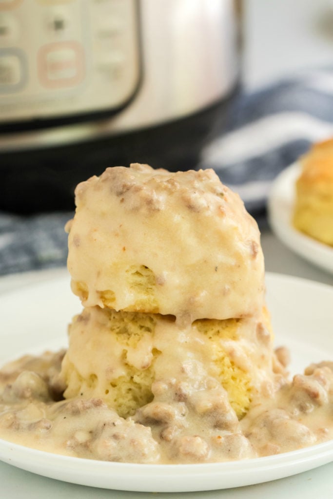 Instant Pot Sausage Gravy Recipe - served over homemade biscuits