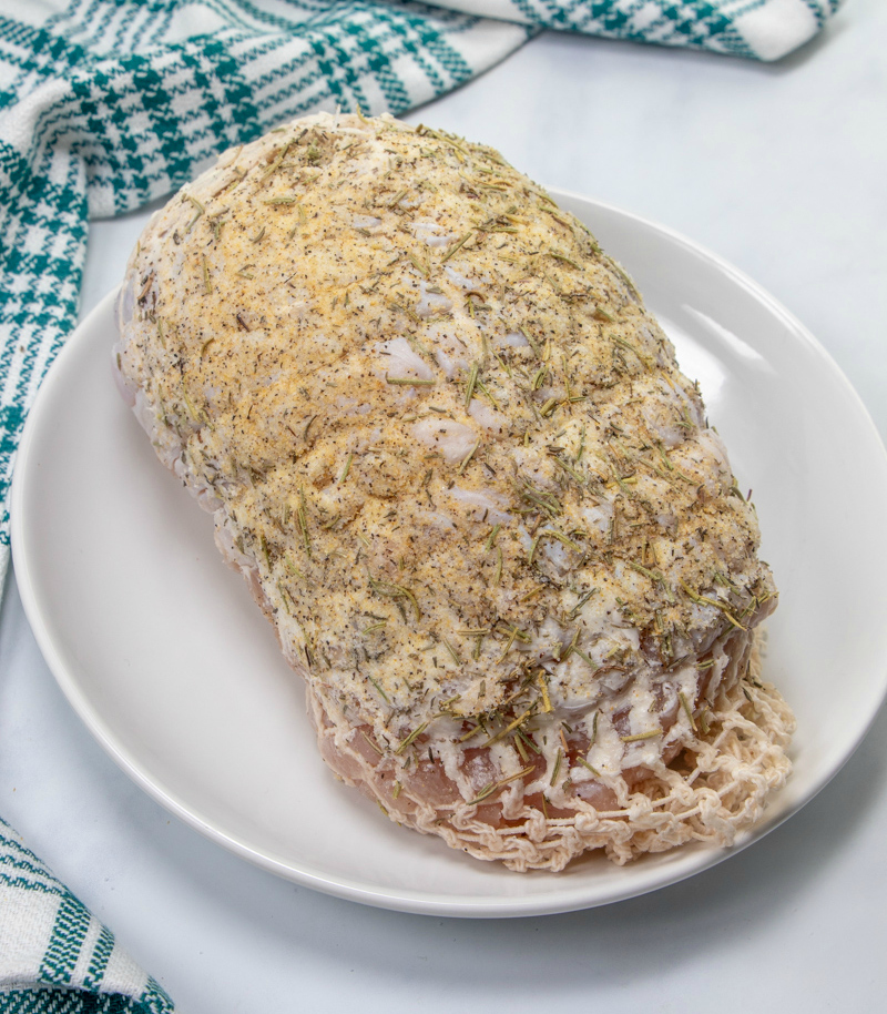 Instant Pot Turkey Breast - Turkey breast with butter and herbs rubbed on outside