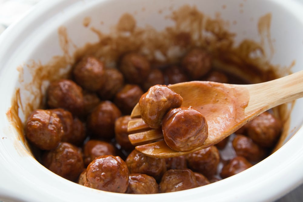 Dr. Pepper Crockpot Meatballs - cooked meatball appetizer in slow cooker