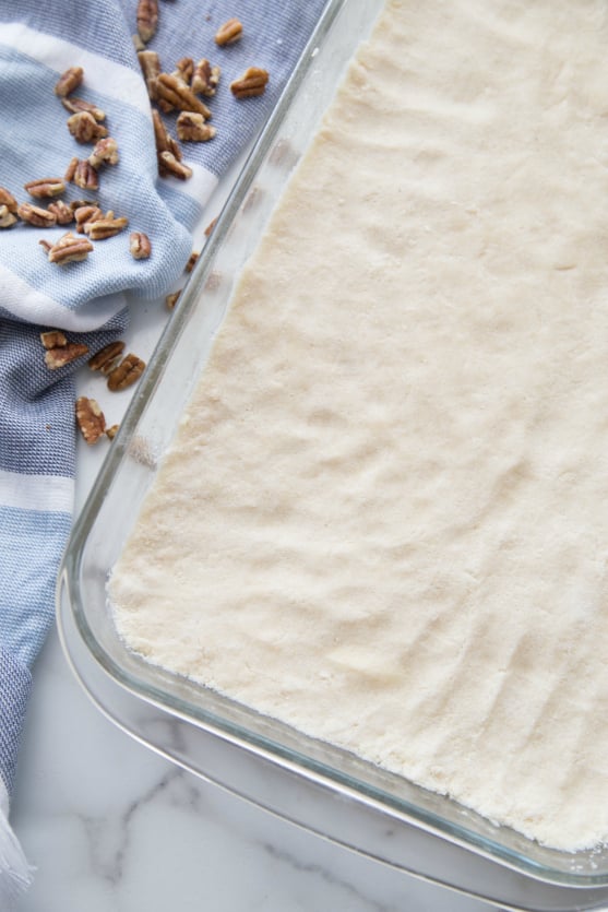 Pecan Pie Bars - pie crust in the bottom of the baking pan