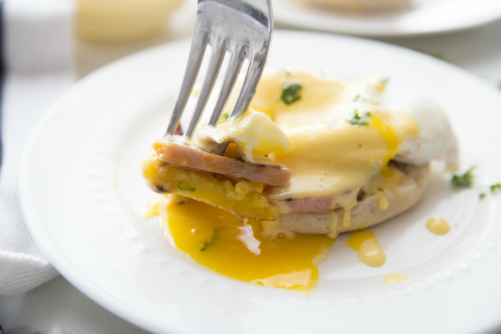 Easy Blender Hollandaise Sauce Recipe - served over eggs Benedict