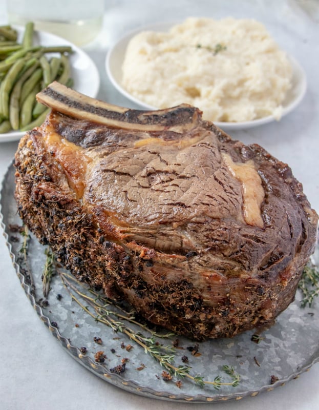 The Best Prime Rib - cooked prime rib on serving platter