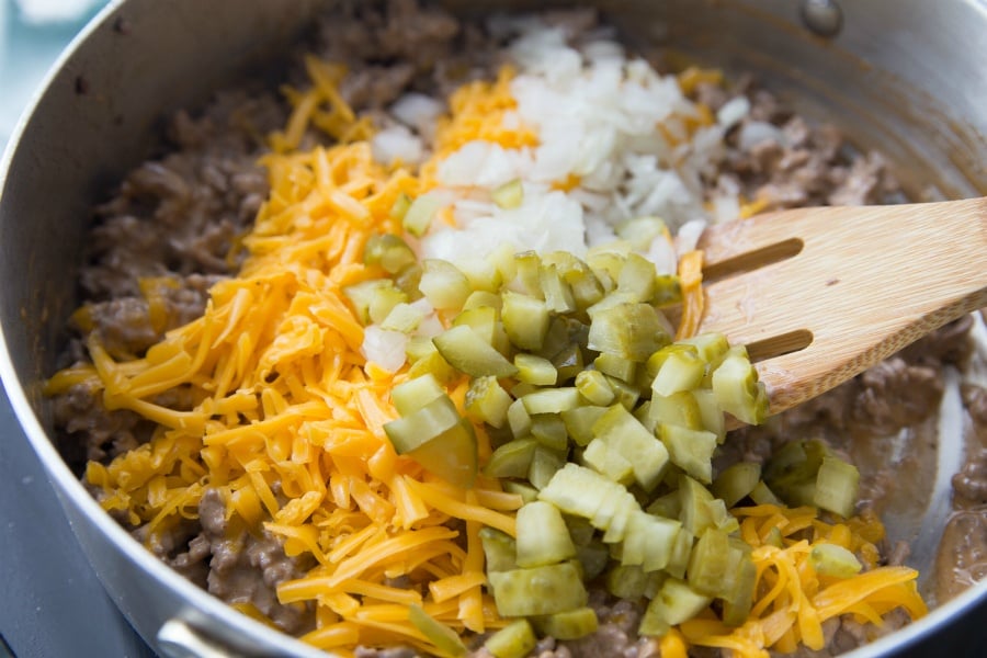 Big Mac Sloppy Joes - ground beef, shredded cheese pickles and diced onion