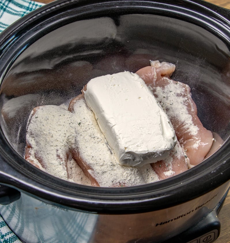 Creamy Crockpot Crack Chicken - ingredients placed in the slow cooker