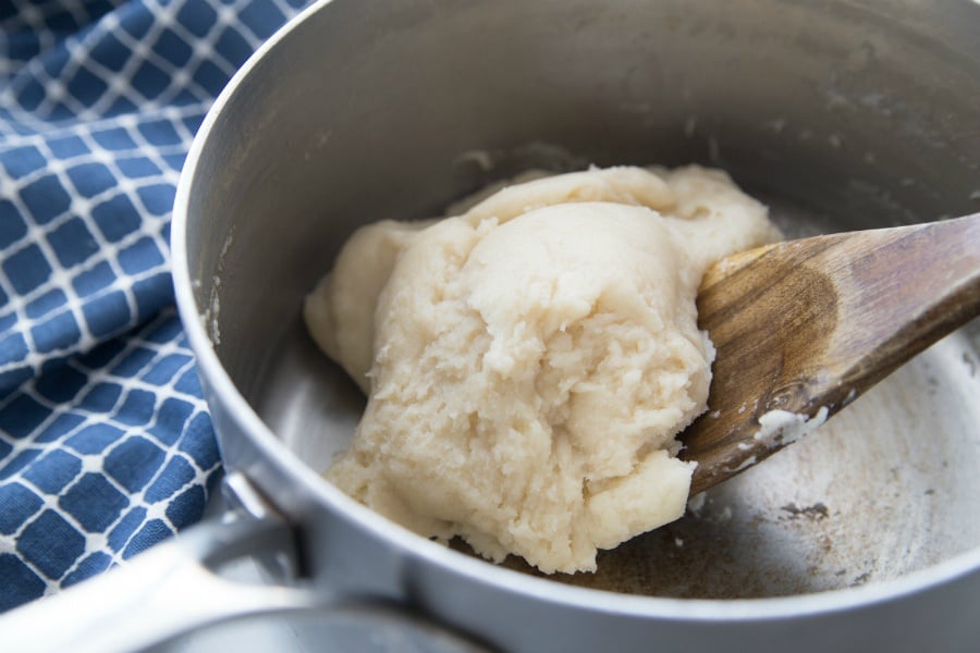 Easy Cream Puff Recipe - Stirring pastry dough in pot