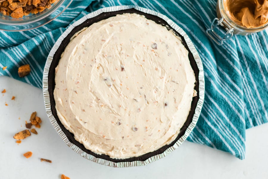 No Bake Butterfinger Pie - creamy mixture in pie crust