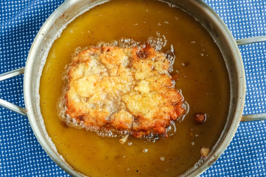 Chicken Fried Steak with White Gravy - chicken fried steak in frying pan