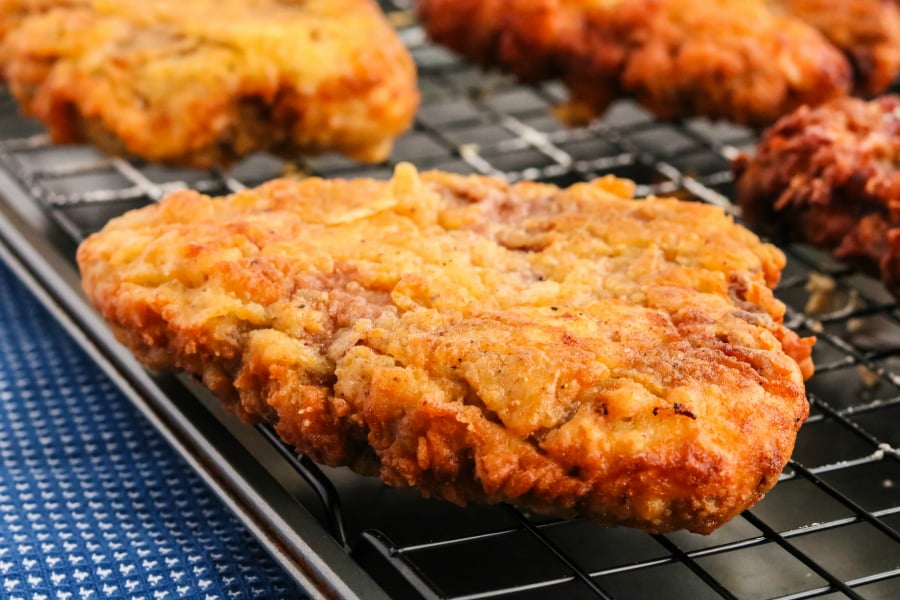 Chicken Fried Steak with White Gravy - fried chicken fried steaks on cooling rack