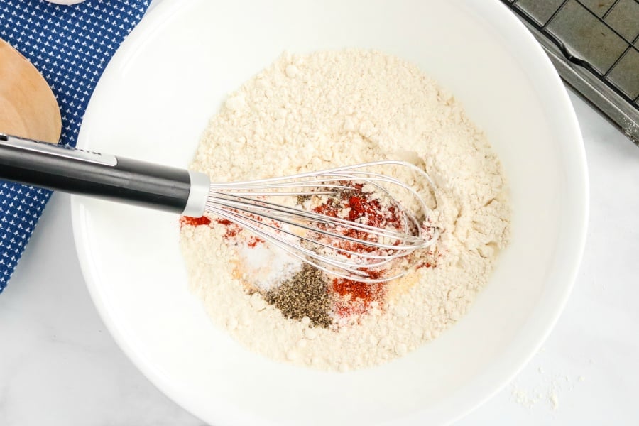 Chicken Fried Steak with White Gravy - mixing seasoning with flour