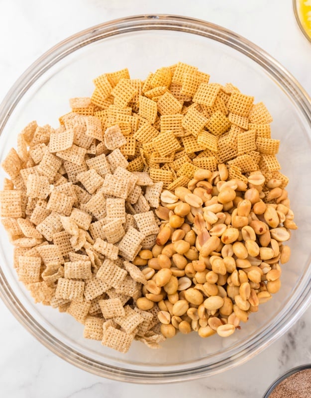 Churro Chex Mix - ingredients in glass mixing bowl