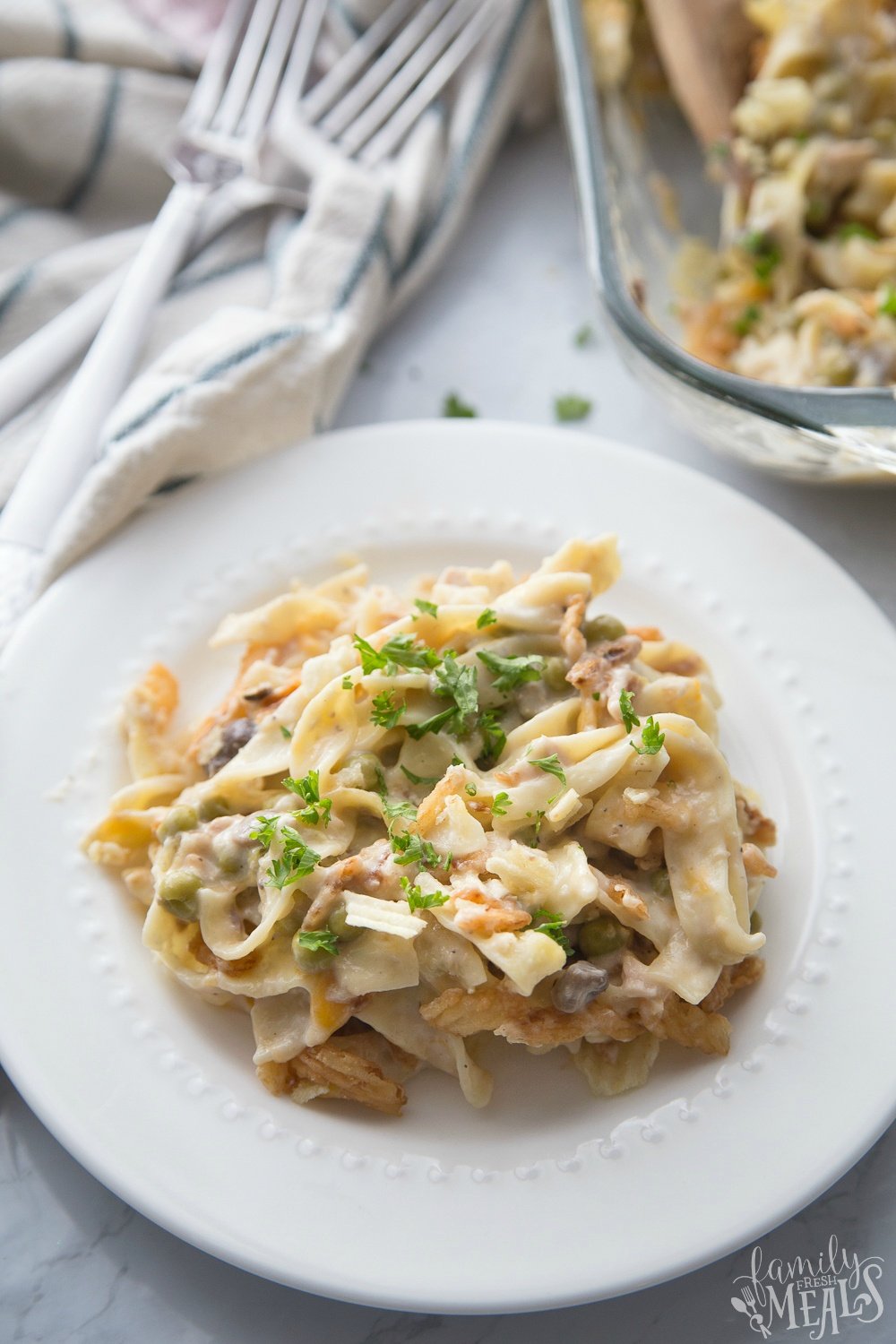 Classic Tuna Noodle Casserole - Served on a white plate - Family Fresh Meals