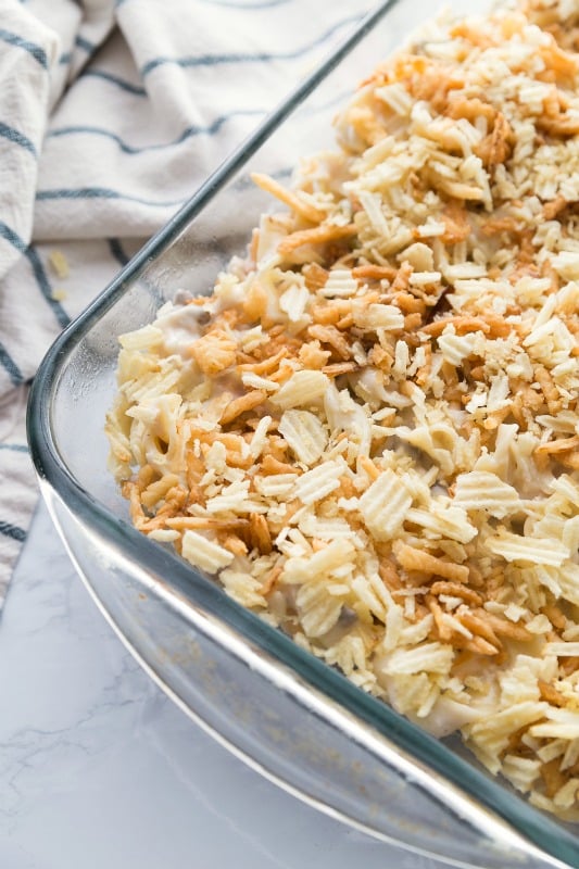 Classic Tuna Noodle Casserole - casserole assembled in a glass baking dish