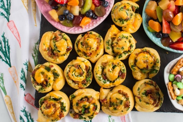 Easter Appetizer Snack Board - cheesy bacon crescent roll ups on snack board