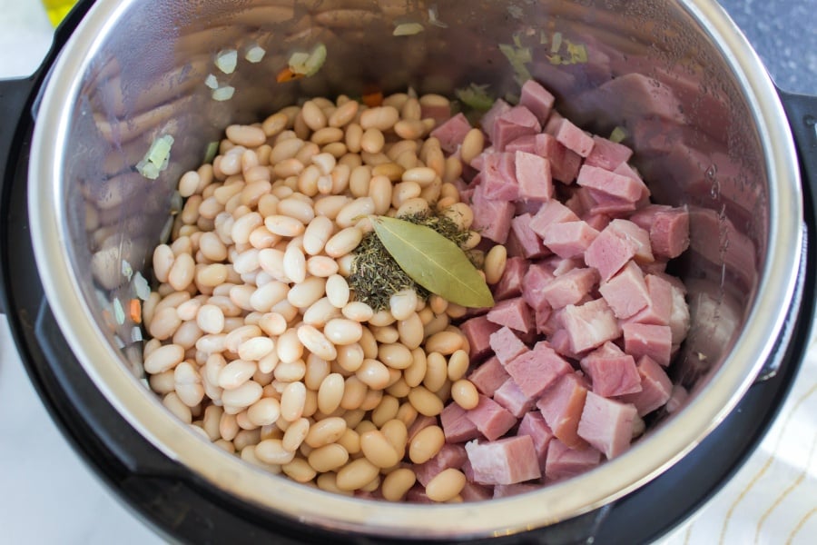 Seasoning, beans and cubed ham in instant pot