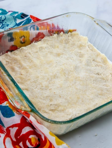 2/3 of crumb mixture pressed into bottom of a 9 x 9 baking dish