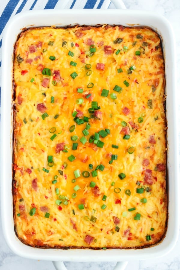 Top down picture of the baked pimento cheese breakfast casserole in a 9 X 13 baking dish