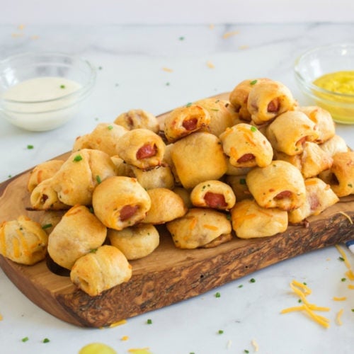 hotdog nuggets on a wooden serving platter