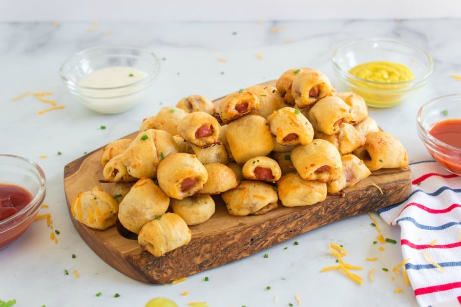 hotdog nuggets on a wooden serving platter