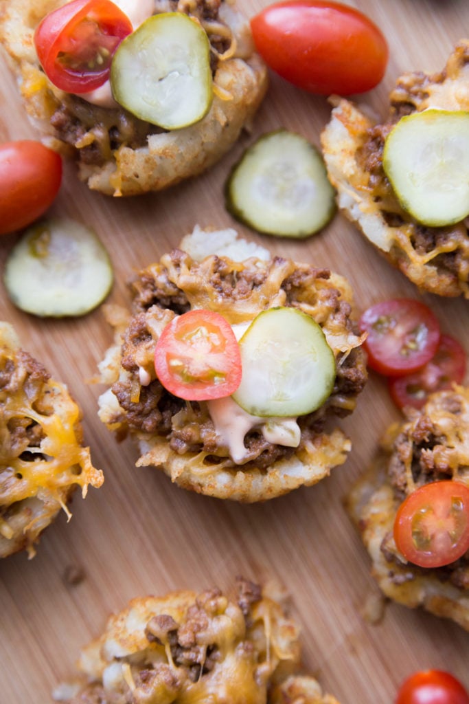 Mini Cheeseburger Tater Tots Cup Recipe from Family Fresh Meals, served on a cutting board