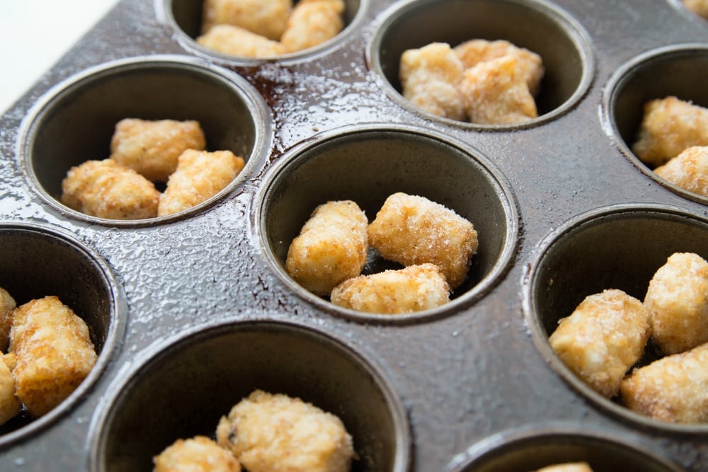 3 tater tots in each muffin tins