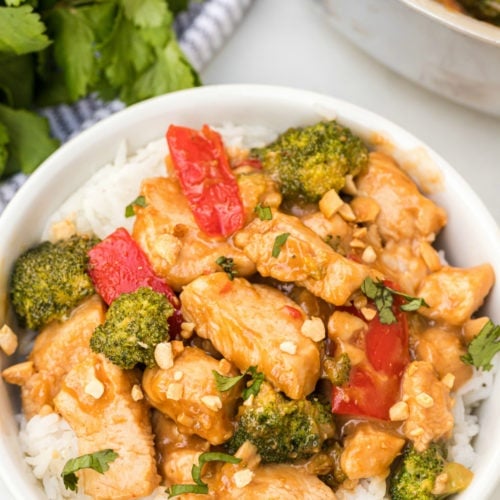 Easy Thai Peanut Chicken Recipe served in a white bowl over rice