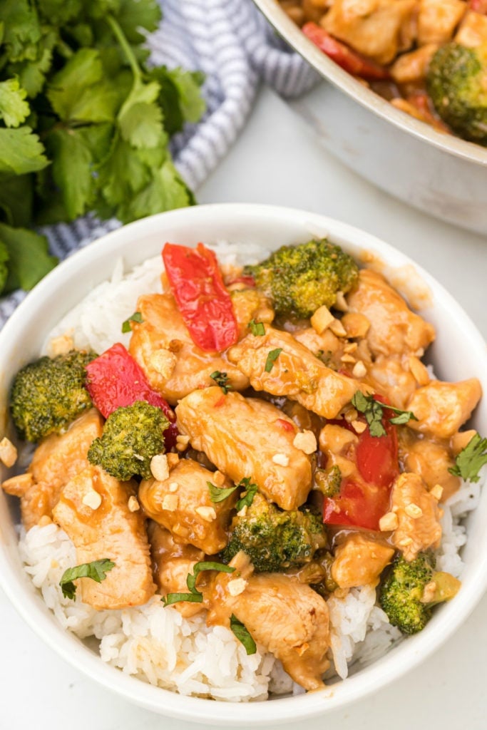 Easy Thai Peanut Chicken Recipe served in a white bowl over rice