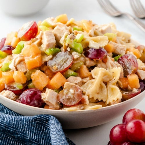 Fresh Fruity Chicken Pasta Salad served in a white bowl