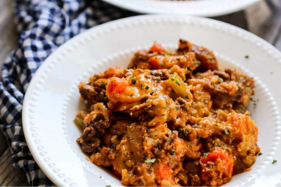 Kitchen Sink Crockpot Casserole served in a white bowl