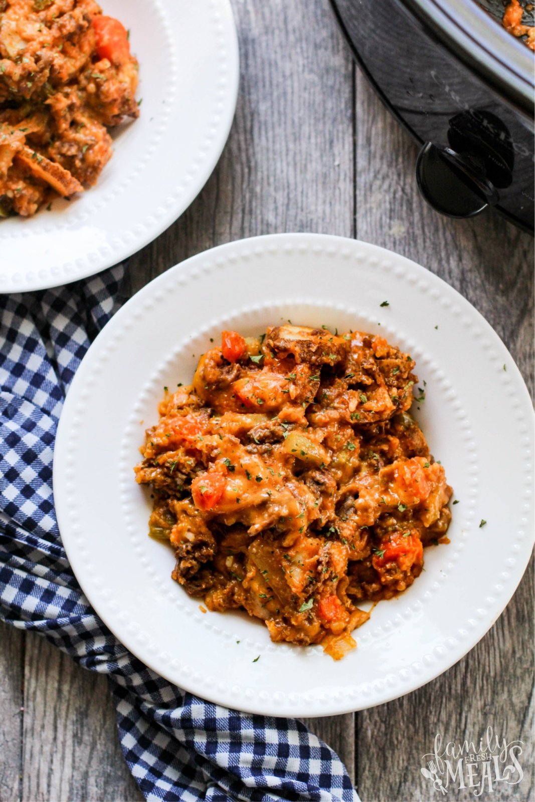 Kitchen Sink Crockpot Casserole served in two white bowls