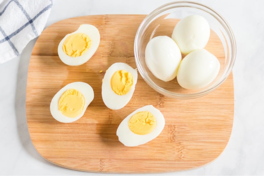 Hard boiled eggs on cutting board