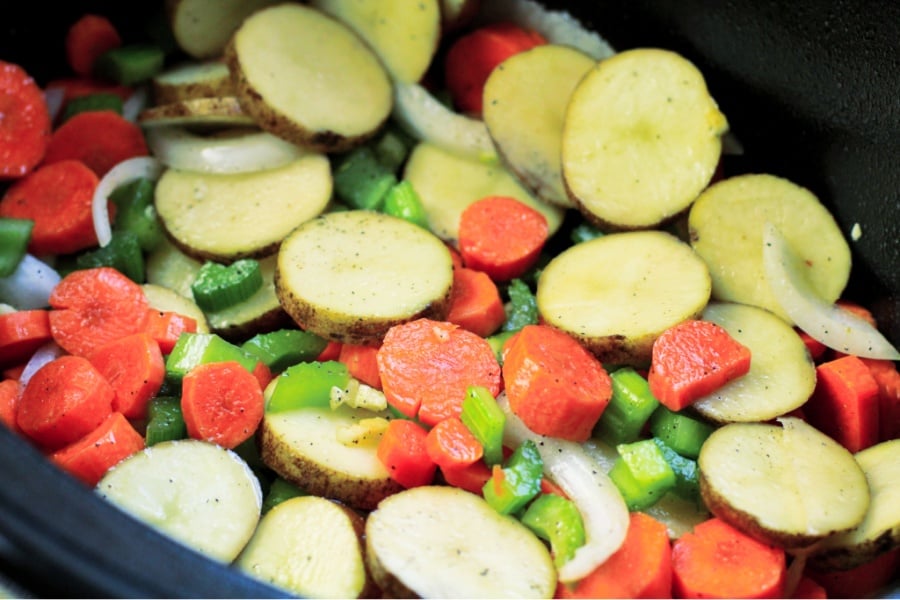 Sliced vegetables in slow cooker