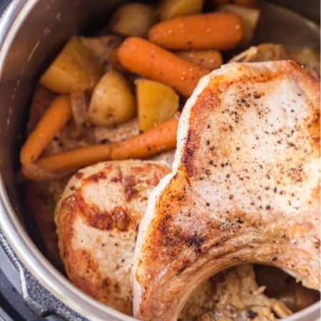 cooked pork chops, carrots and potatoes in the instant pot