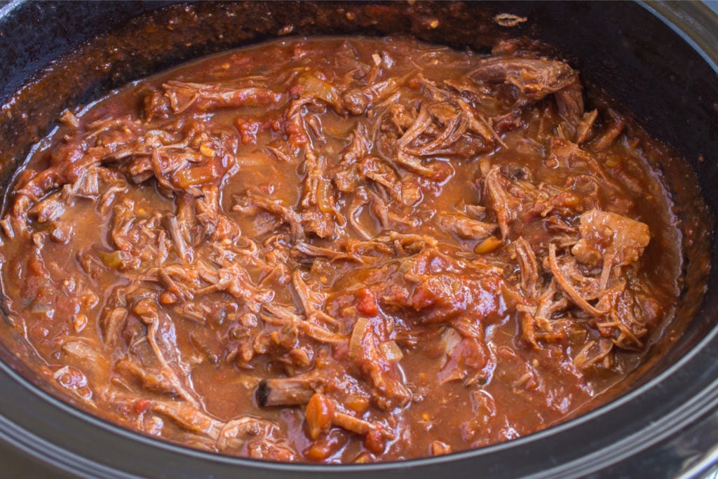 shredded beef and sauce in slow cooker