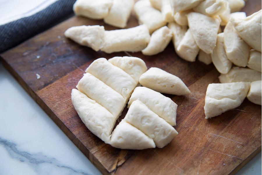 biscuits cut up on a cutting board