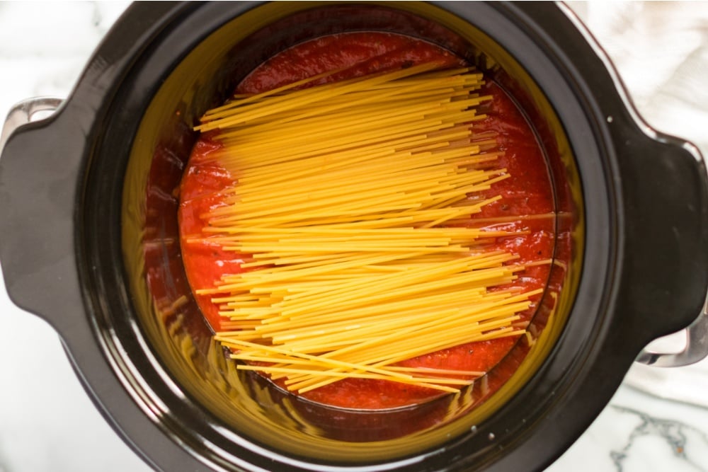 sauce and noodles in a slow cooker