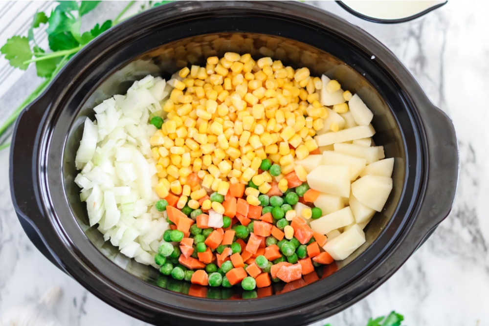 ingredient for Chicken Pot Pie Soup in a slow cooker