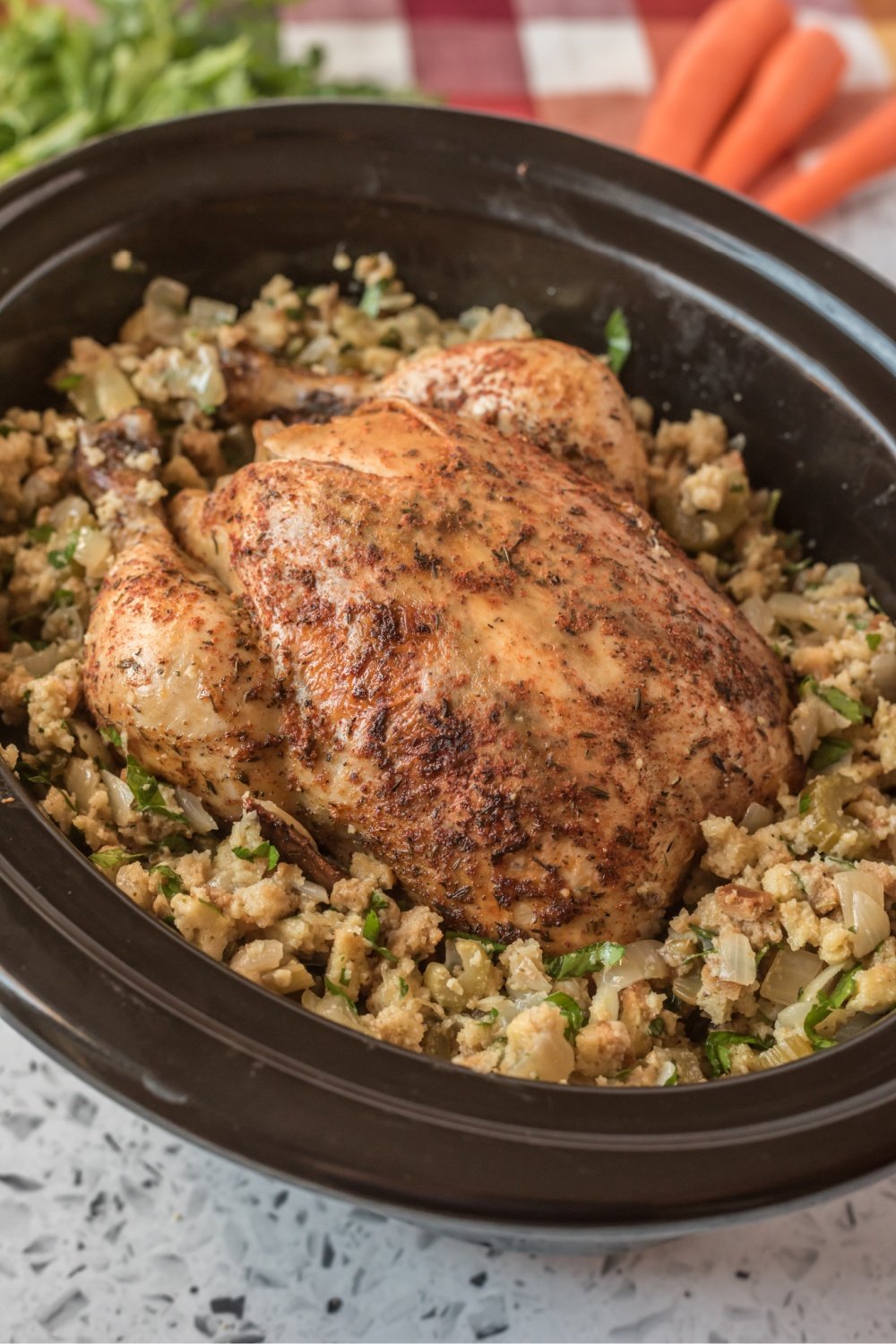 This Crockpot Whole Chicken and Stuffing is a simple yet delicious one-pot meal that is  great dish for the holidays or any night of the week. via @familyfresh