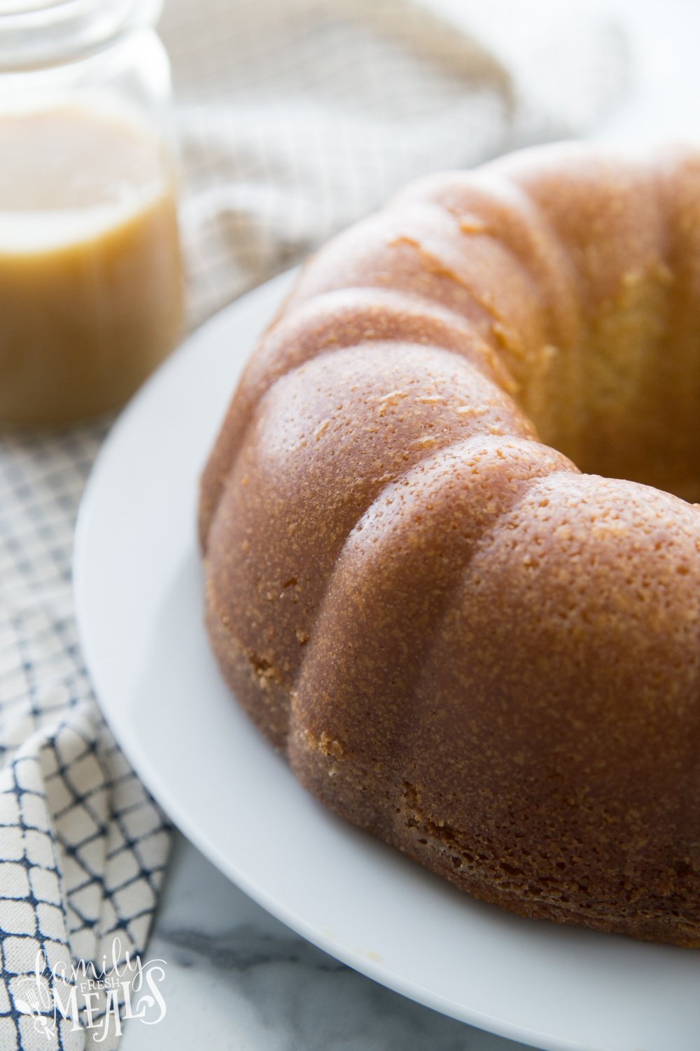 Amaretto Pound Cake on a white platter 