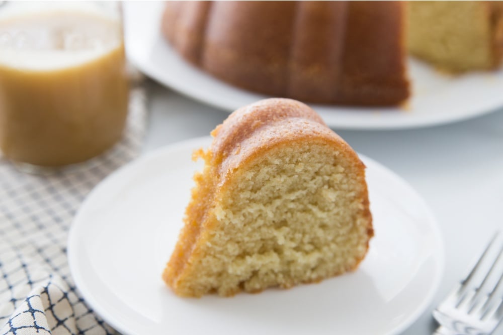 A slice of Amaretto Pound Cake on a plate