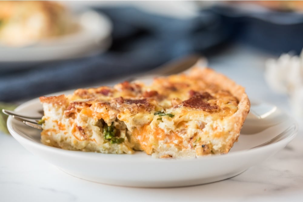 slice of quiche on a plate