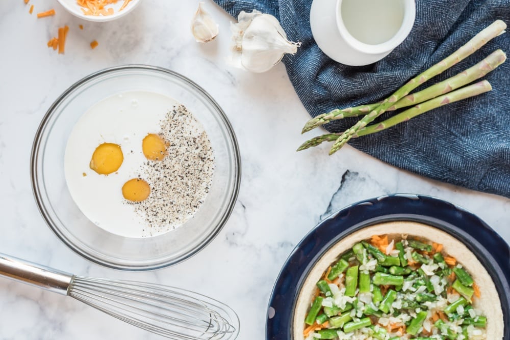 eggs, half and half cream, and pepper in a mixing bowl