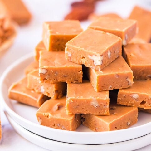 Butterscotch Fudge pieces stacked on a plate