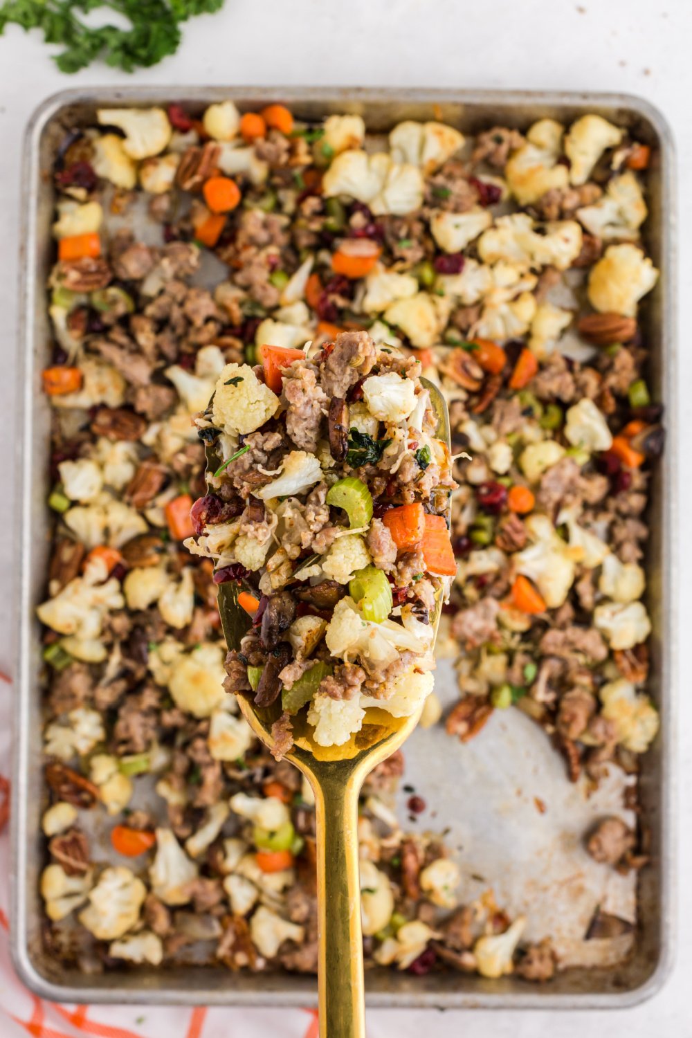 This Savory Cauliflower Stuffing tastes exactly like stuffing. It’s loaded with all the traditional flavors of onion, herbs, sausage, veggies, cranberries and nuts. via @familyfresh
