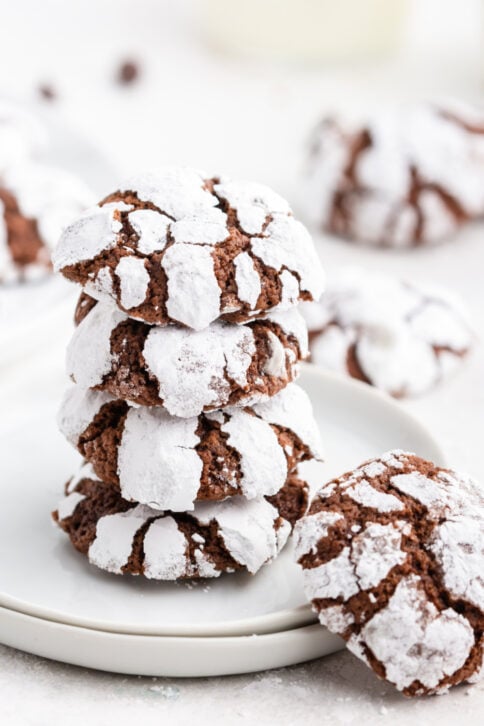 Chocolate Crinkle Cookies stacked on a plate