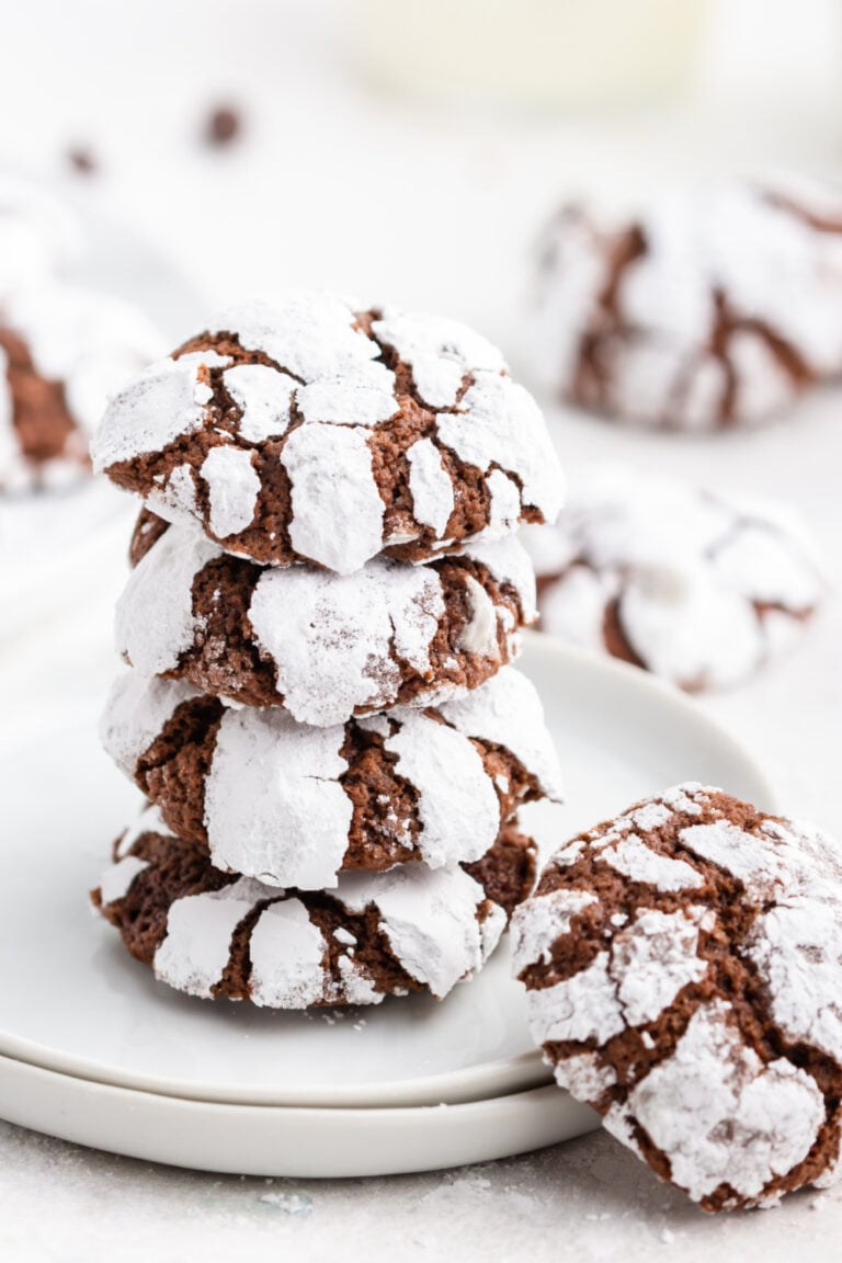 Chocolate Crinkle Cookies stacked on a plate