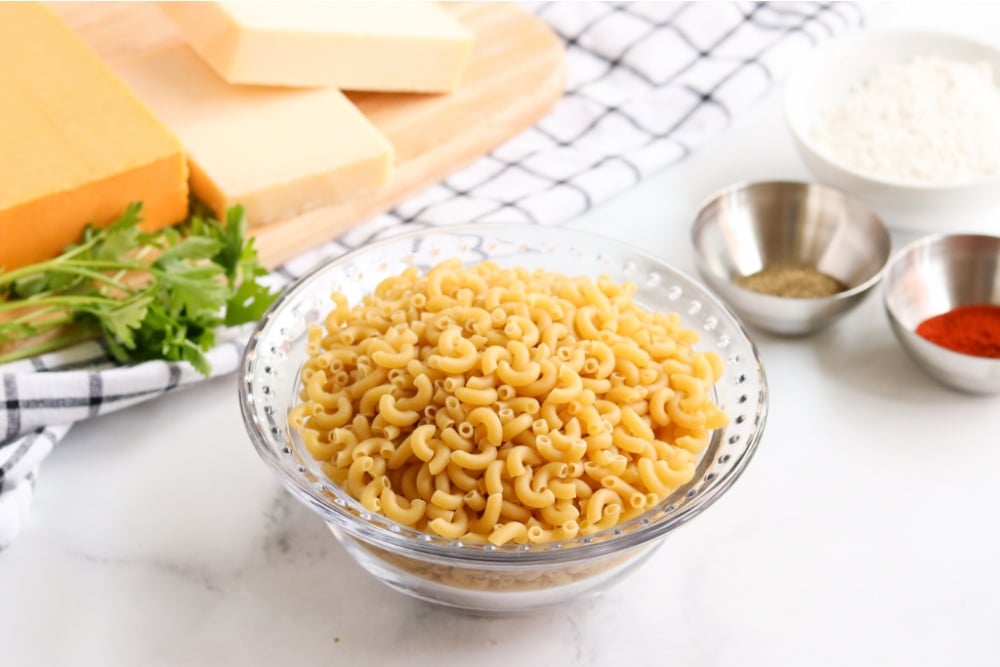 uncooked pasta in a glass bowl