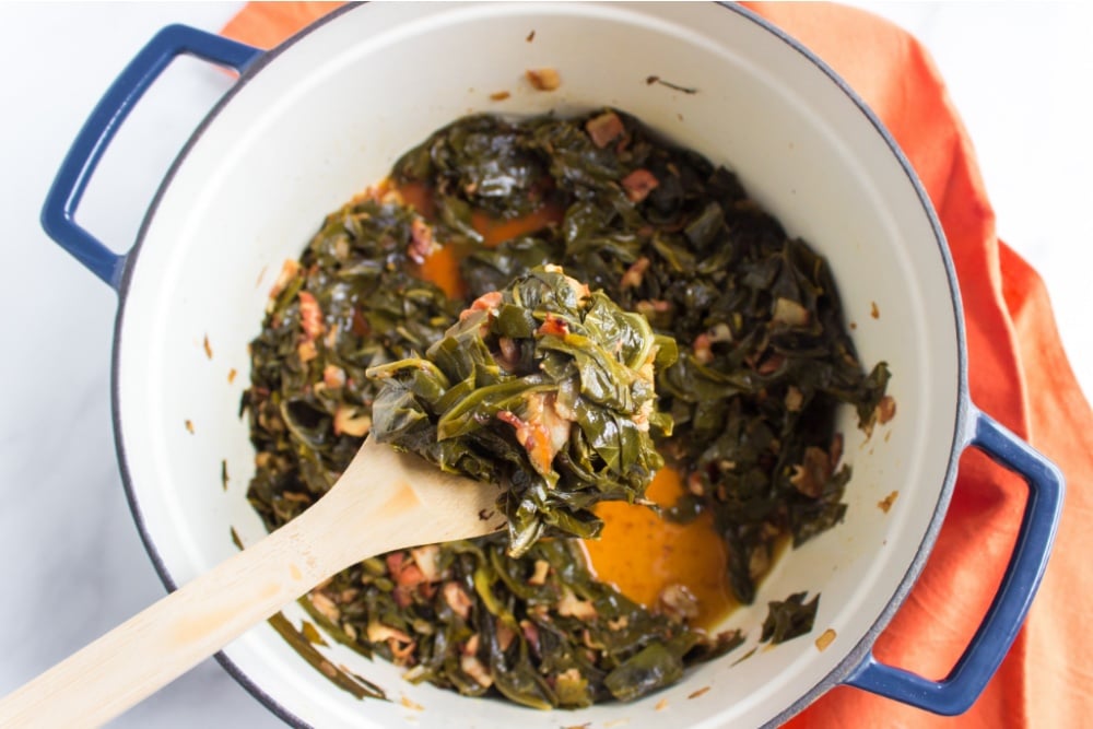 cooked southern collard greens in a cooking pot