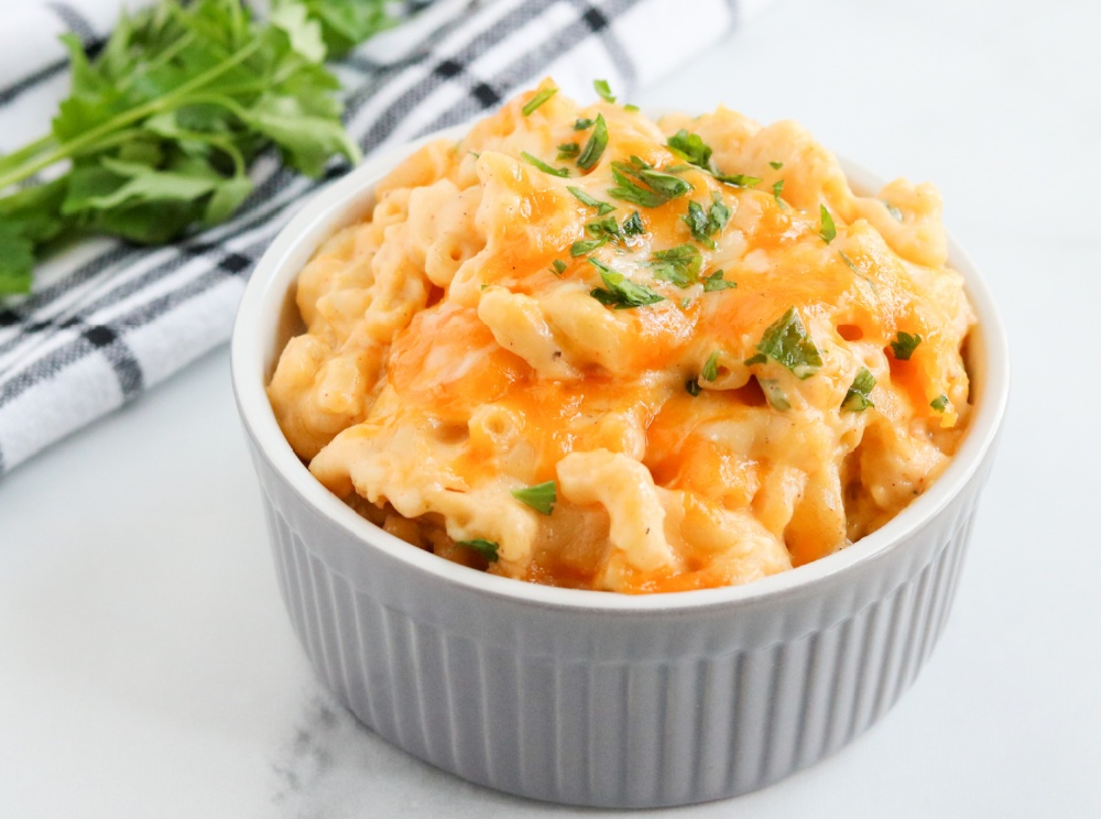 baked mac and cheese in a small white dish