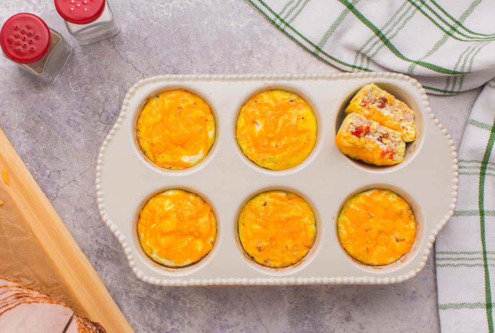 cooked egg cups in a muffin tin