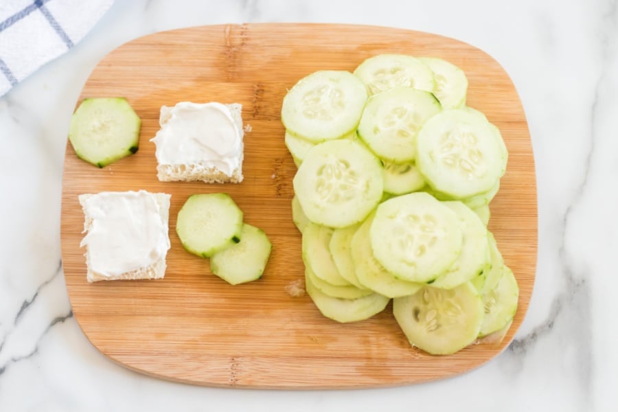 showing how to make mini cucumber sandwiches